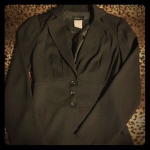 Black two piece suit with three button detail